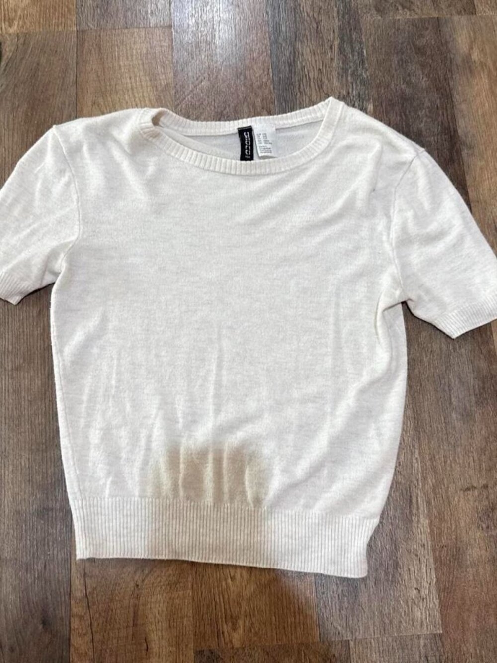 Divided white cropped sweater